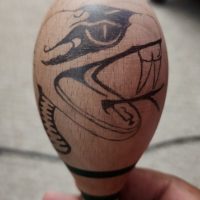 First, I did a pencil sketch onto the maraca